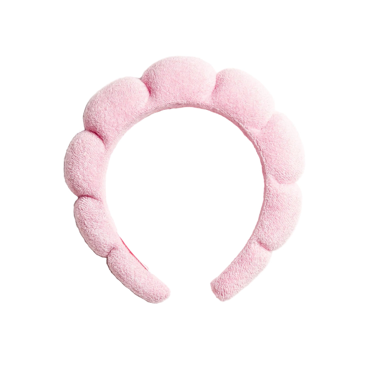 Pink fuzzy headband on a white background