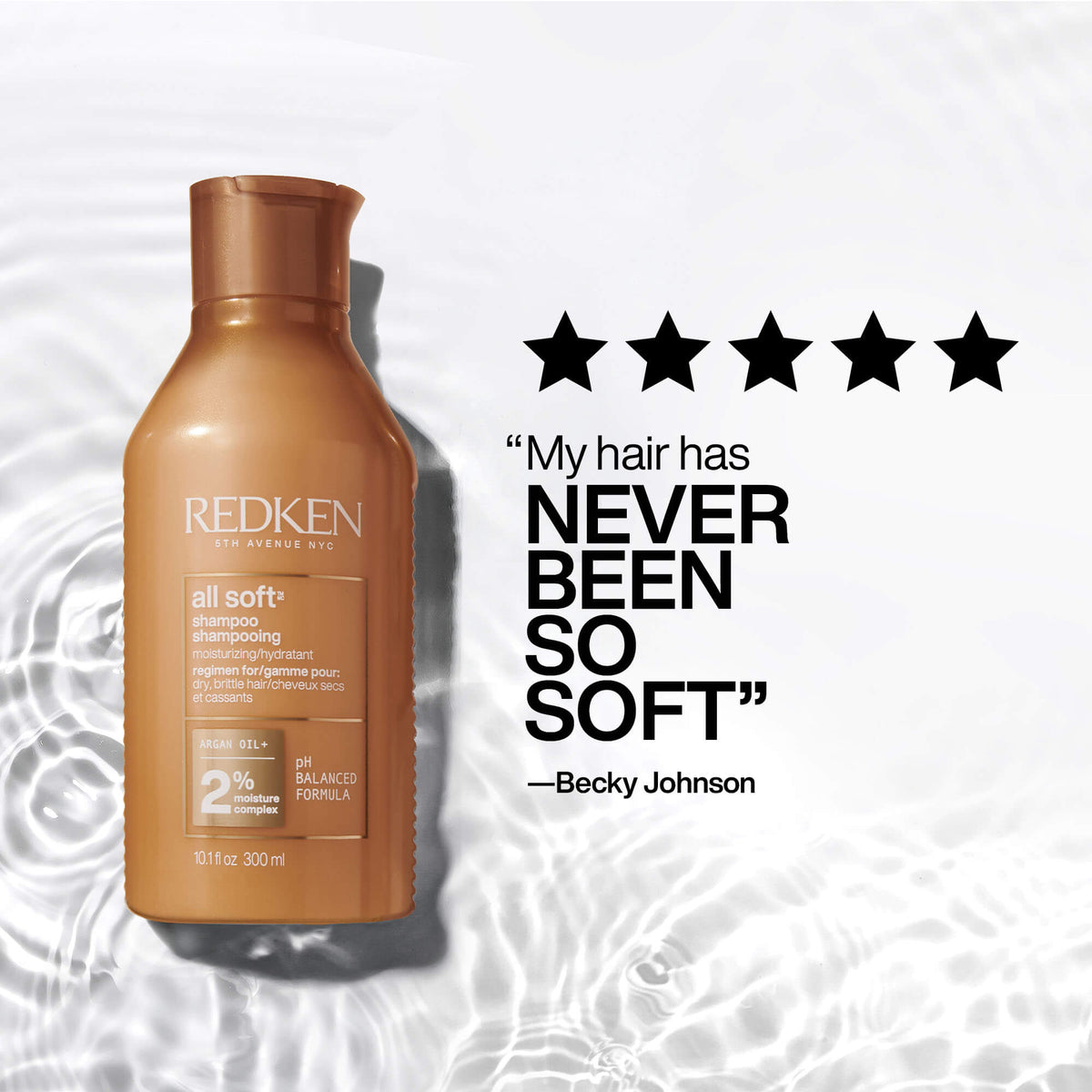 Redken All Soft Shampoo bottle in a metallic bronze-brown color, shown next to a customer quote graphic on a white background with water ripple patterns.