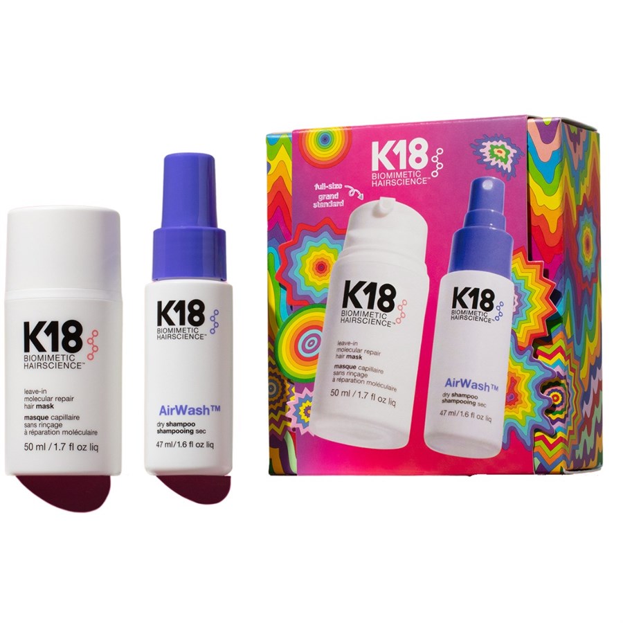 K18 Full-Size Hair Science kit featuring a white and purple AirWash bottle, a white QSP-Ince bottle, and a vibrant multicolor patterned box on a white background.