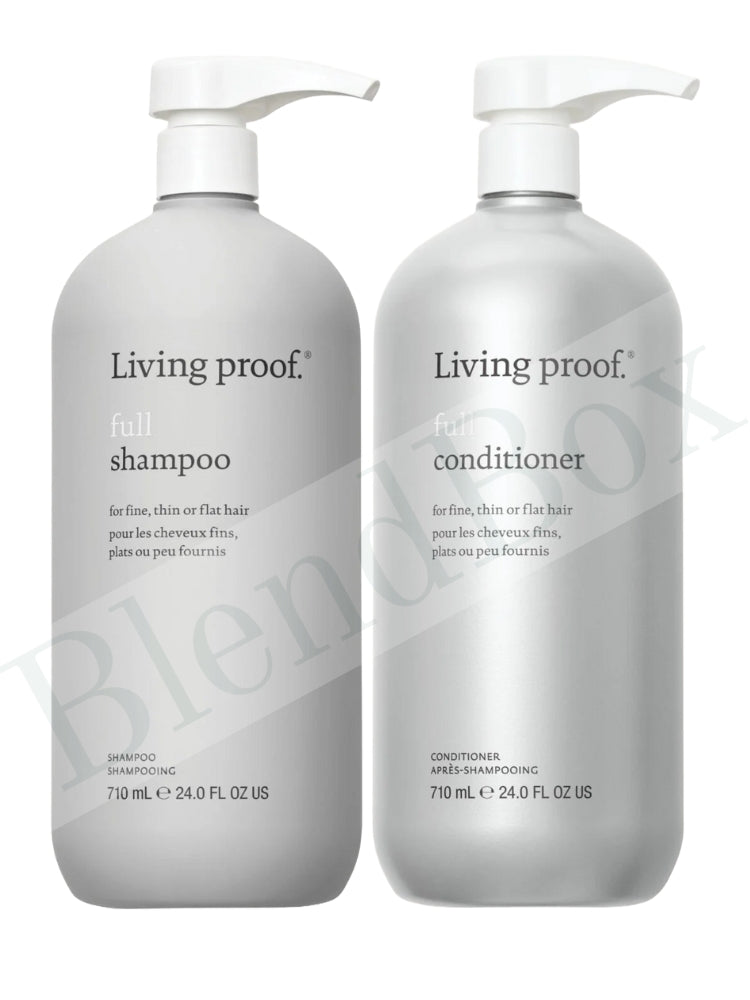 Living Proof shampoo and conditioner bottles on a white background