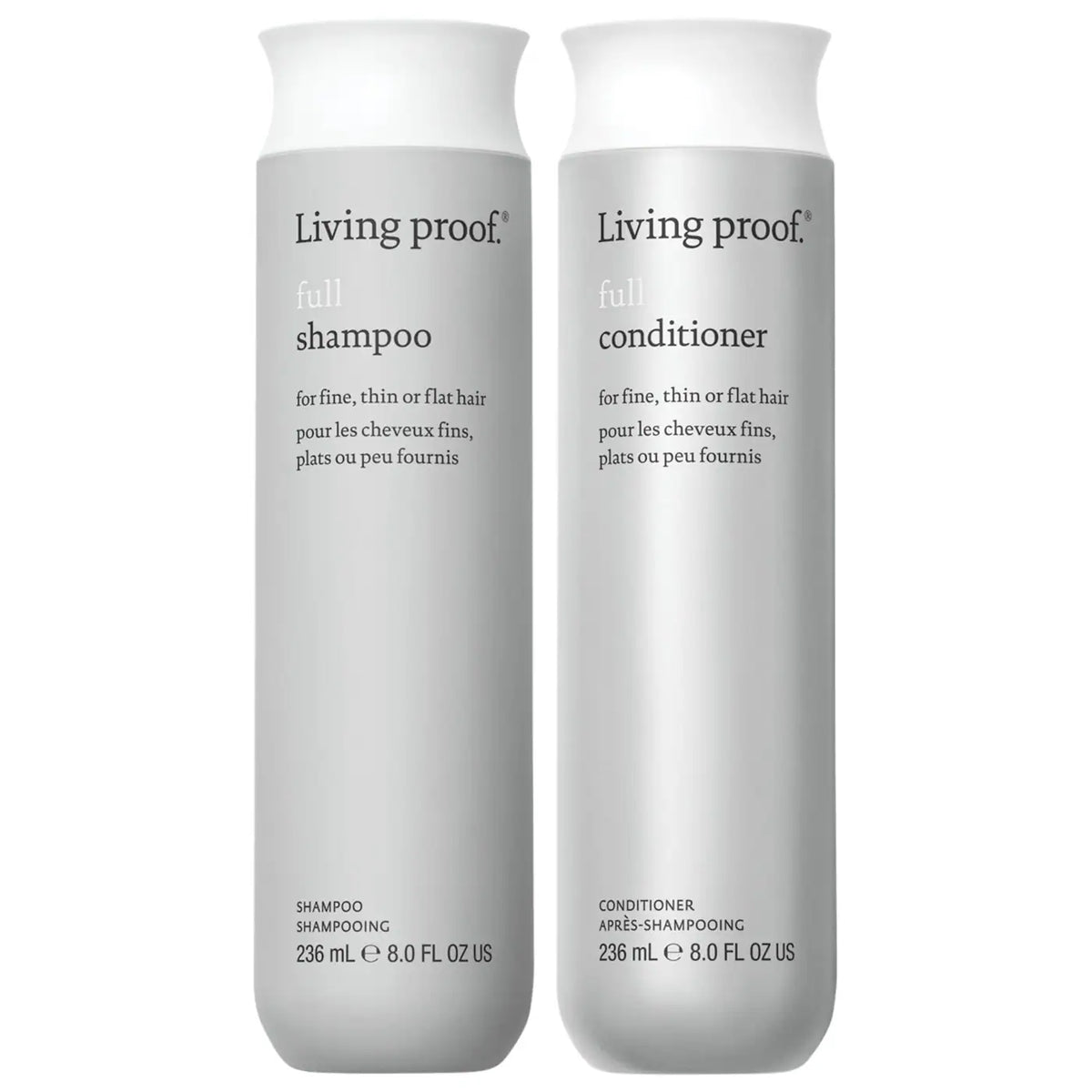 Living Proof shampoo and conditioner bottles on a white background