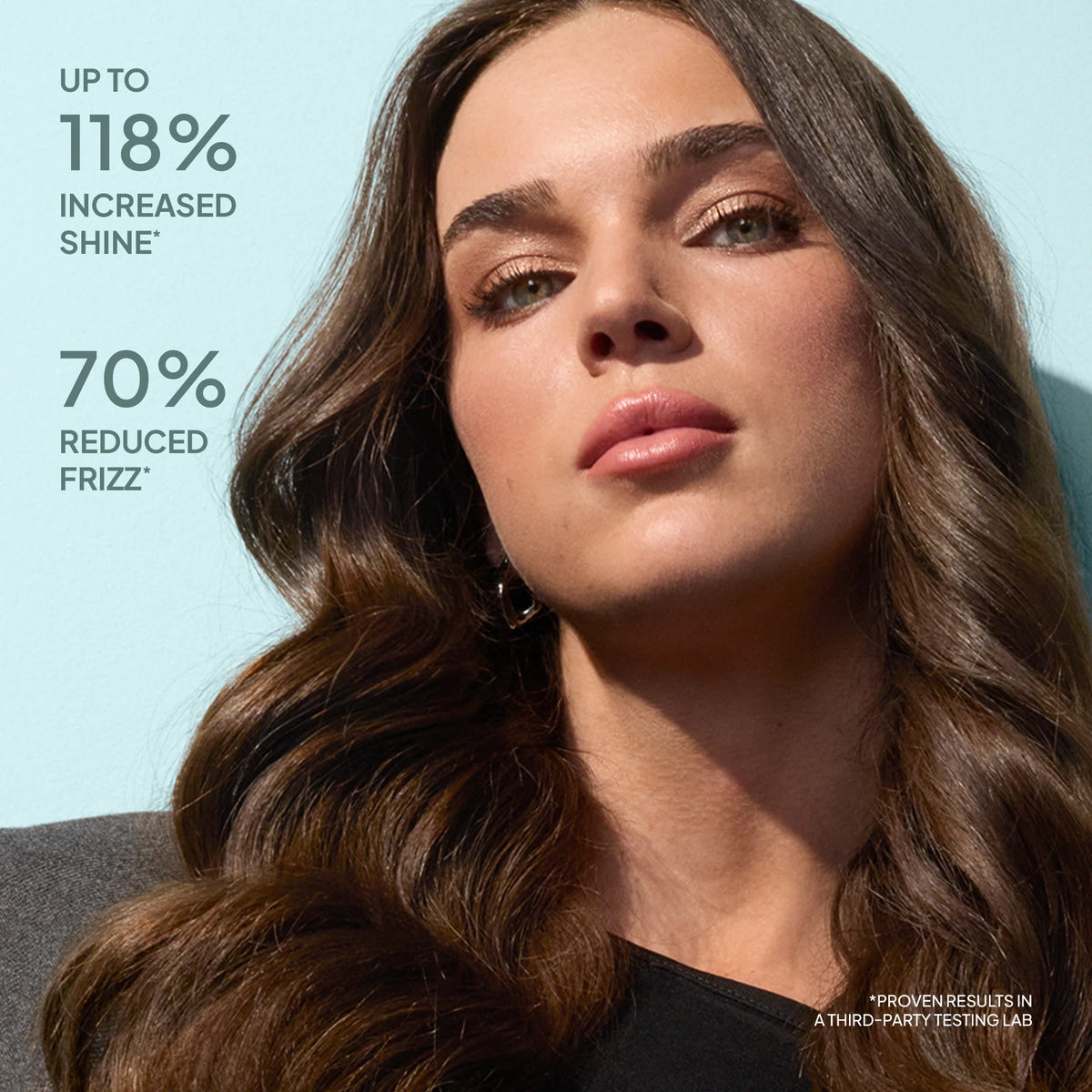 Woman with styled hair against a light blue background with text about hair product benefits.