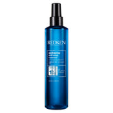 Redken Extreme Anti-Snap Treatment bottle on a white background