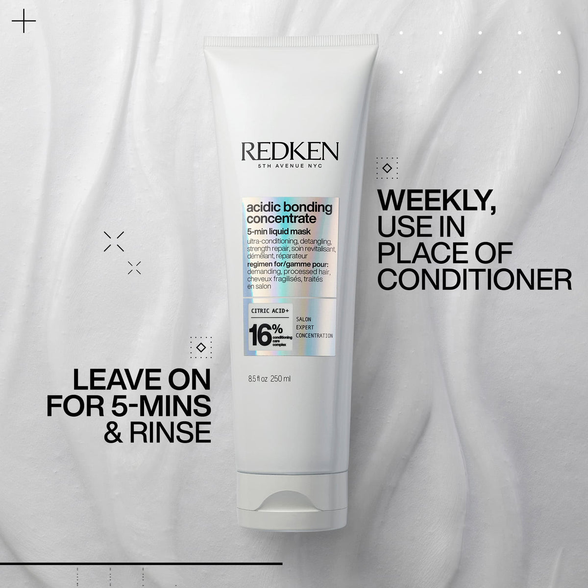 Redken hair care product with usage instructions on a gray background