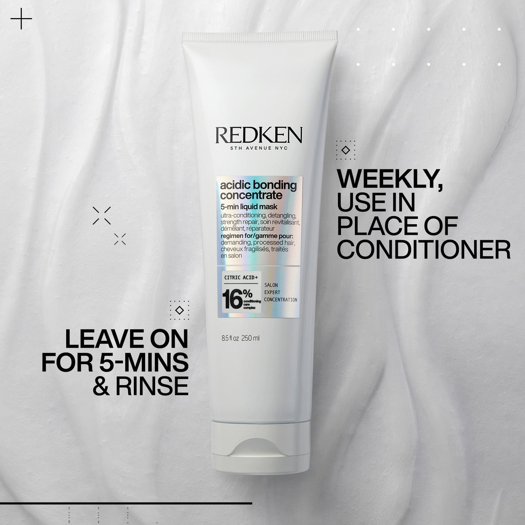Redken hair care product with usage instructions on a gray background