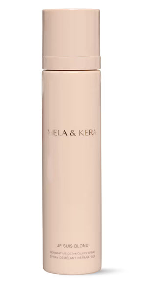 Beige bottle with 'Nela & Kera' branding on a white background