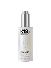 K18 Biomorphic Hairscience FutureIQ Serum in a white bottle with a metallic silver pump dispenser, shown on a plain white background.