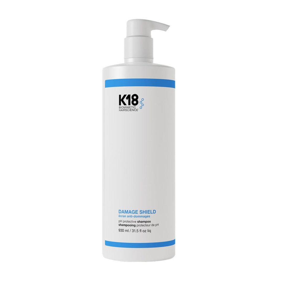 K18 Damage Shield shampoo bottle on a white background