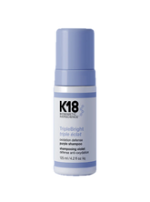 K18 purple shampoo bottle on a white background