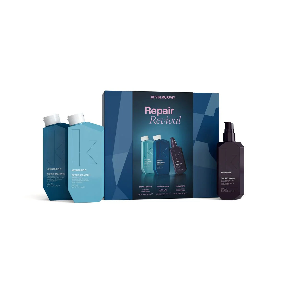 Kevin Murphy Repair Revival haircare set featuring a blue and black box with two blue bottles and one black spray bottle on a white background.