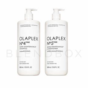 Two white pump bottles of Olaplex No.4 Fine Bond Maintenance Shampoo and No.