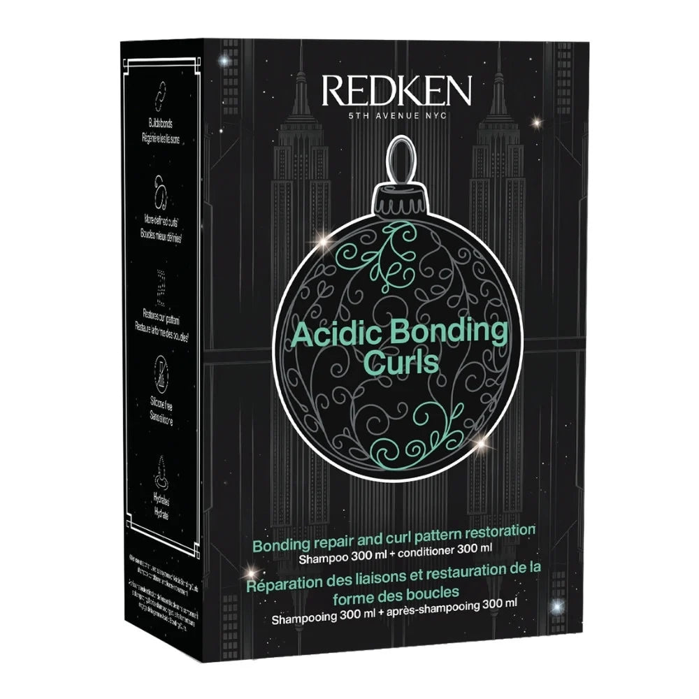 Redken Acidic Bonding Curls shampoo and conditioner box, 300 ml each, in black packaging with a large ornament graphic and teal text.
