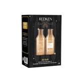 Redken All Soft Moisture Set with argan oil, featuring a black and gold gift box containing two beige bottles, shown on a plain white background.