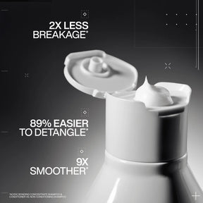 White hair care product with text highlighting benefits on a dark background
